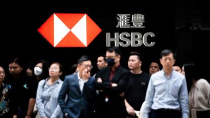 Signage at a HSBC Holdings Plc bank branch in Hong Kong, China