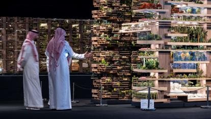 Visitors discover images and models of ’The Line’ project in Riyadh, Saudi Arabia
