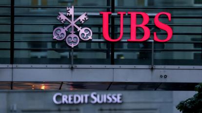 Logos of Swiss banks Credit Suisse and UBS are seen in Zurich, Switzerland