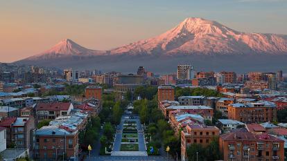 View over the city of Yerevan, capital of Armenia, with the two peaks of Mount Ararat in the background at sunrise