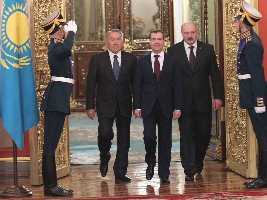 (From left to right) Kazakhstan’s president Nursultan Nazabayev, Russia’s then-president Dmitry Medvedev and Belarus’s president Alexander Lukashenko enter a December 2011 economic summit, in which they discussed plans to create closer economic ties between the three countries