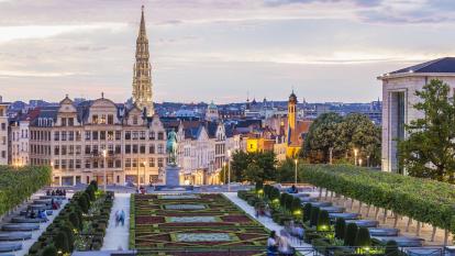 Belgium, Brussels, Mont des Arts, park and townhall tower, lower city in the evening.