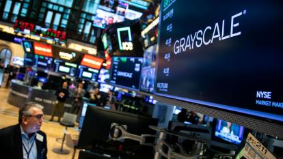 Grayscale Bitcoin Trust ETF signage on the floor of the New York Stock Exchange in New York, US