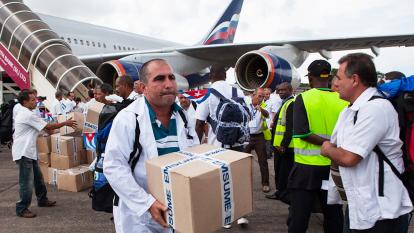 Cuban medical staff arrive in Africa during the Ebola breakout