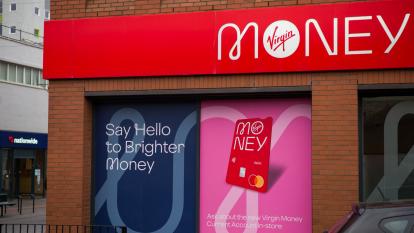 A branch of Virgin Money on a UK high street; in the background, a branch of Nationwide Building Society 