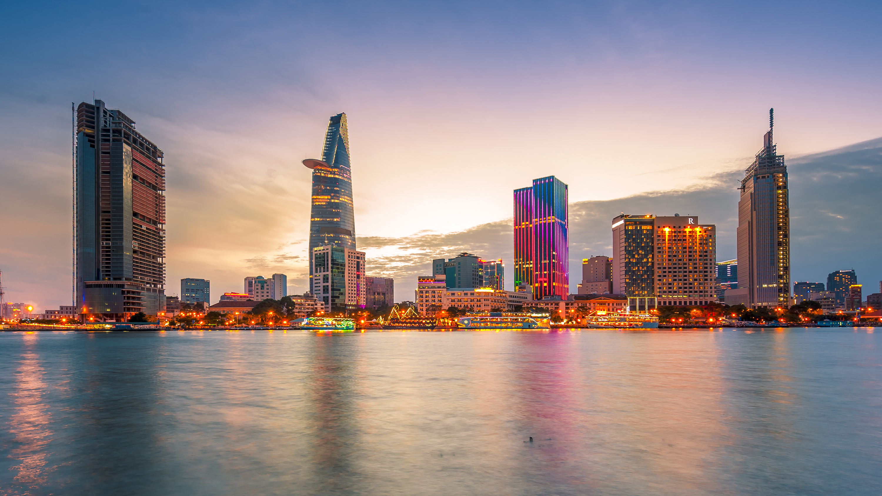 The Saigon financial district across the water at sunset