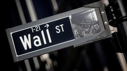 A street sign for Wall Street is seen in the financial district in New York, U.S.